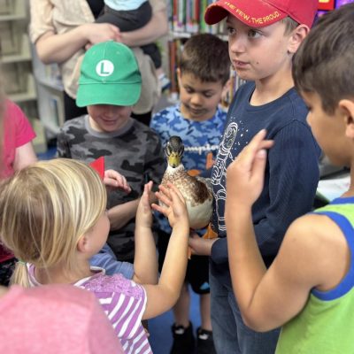 Children participating in a library program