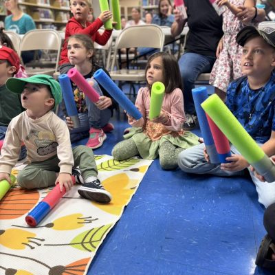 Children participating in a library program